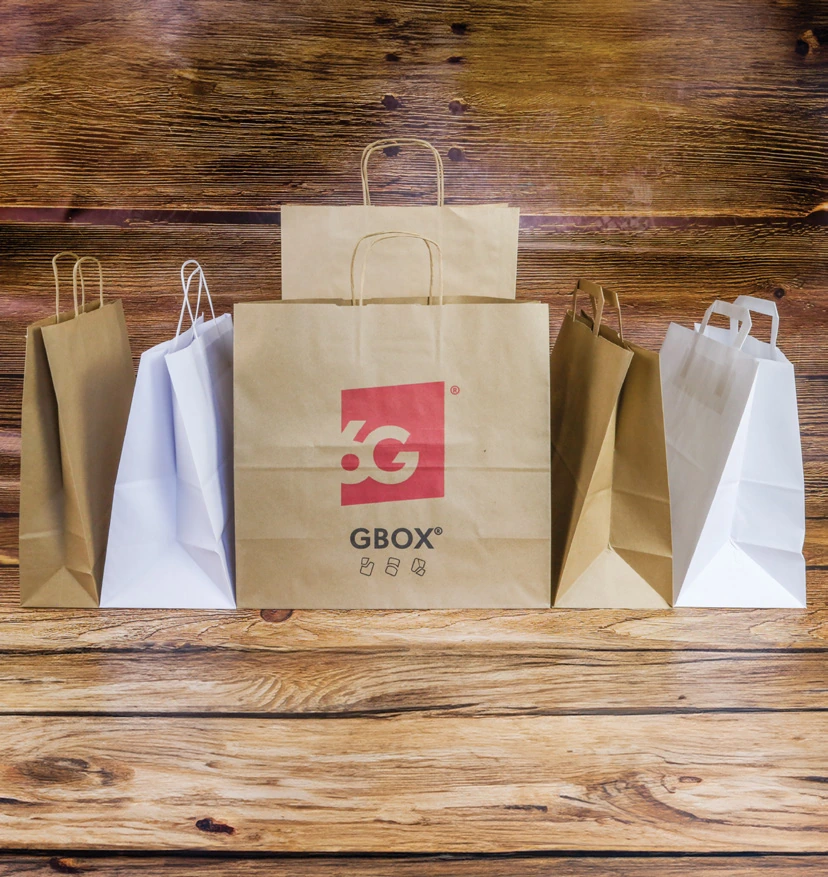 Torby papierowe GBOX z uchwytem skręcanym i płaskim.